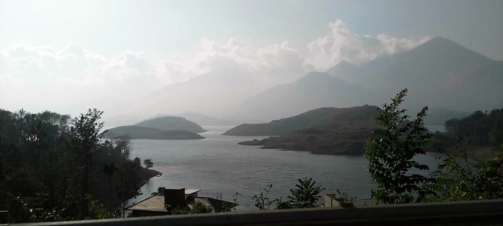 The lake and mountains at the Banasura Dam