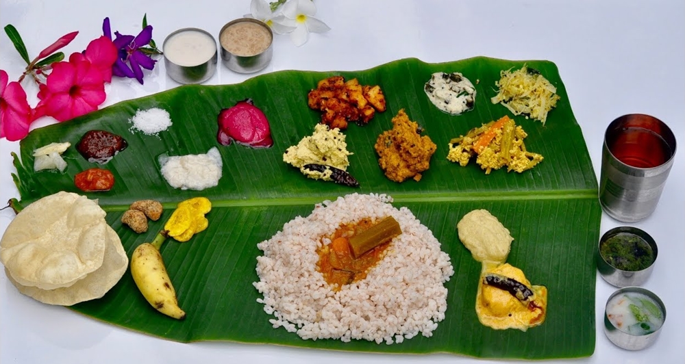 Side dishes of Sadhya surrounding the white rice