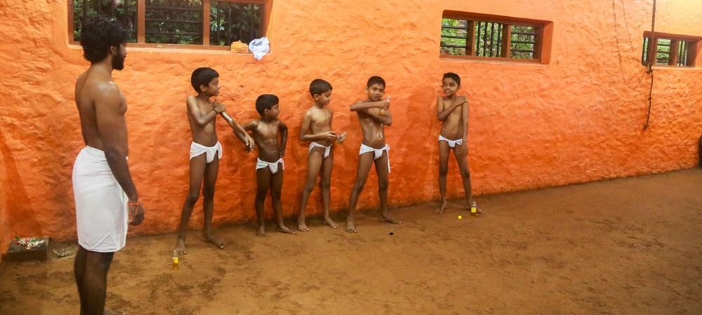 Kids applying oil before the training