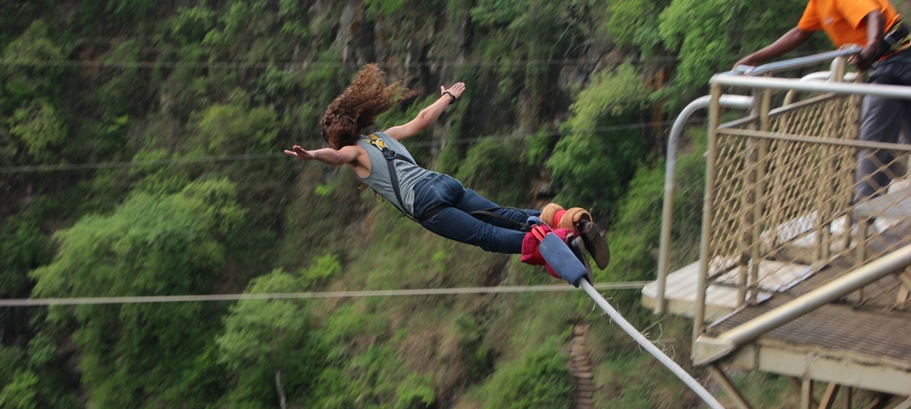 Woman bungee jumping