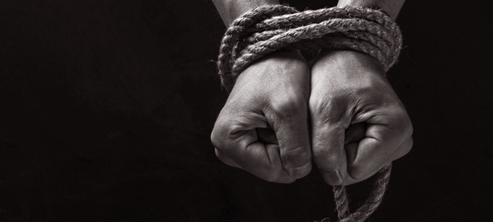 Hands tied with a rope