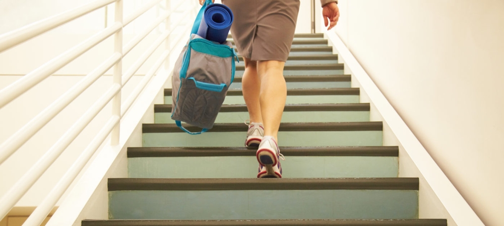 Woman walking up the stairs