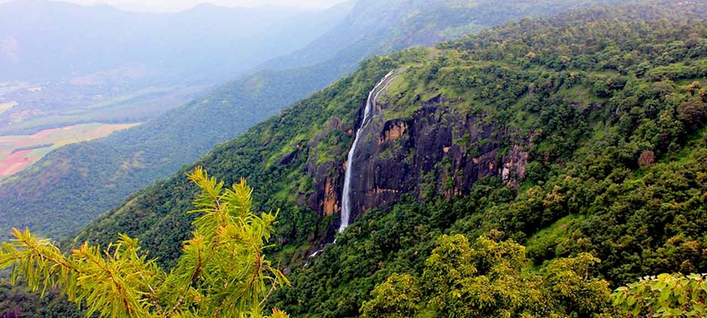 The waterfall and scenic landscape at Chellarkovil