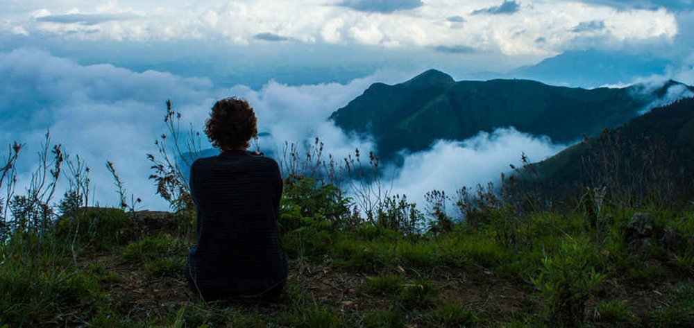 Woman enjoying the view from the Doddabetta Peak