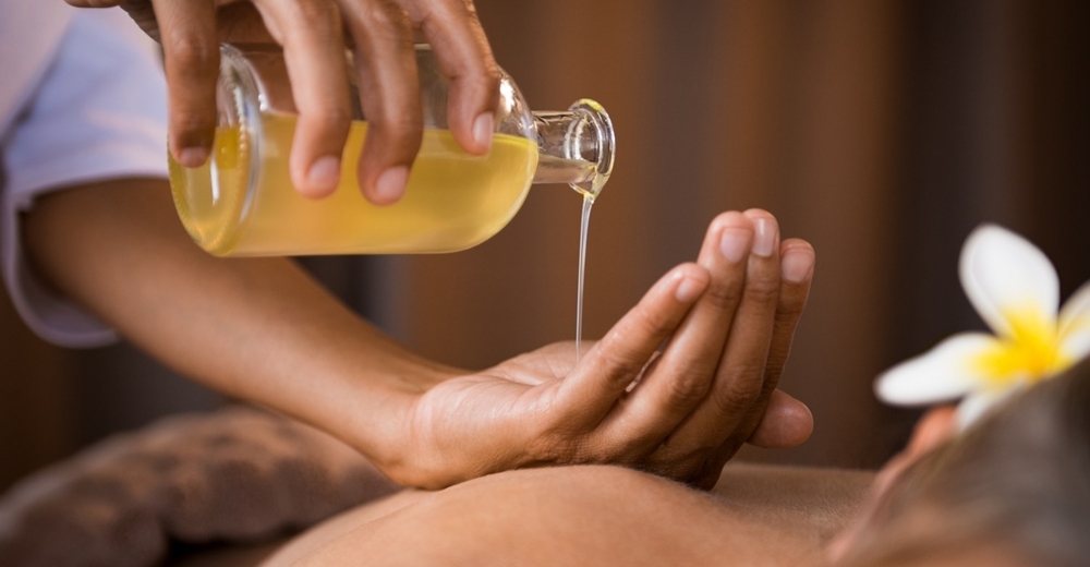 Oil being used for ayurvedic massage