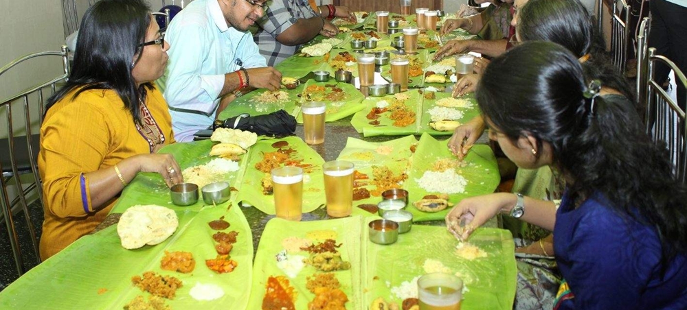 Visitors eating the authentic local cuisine