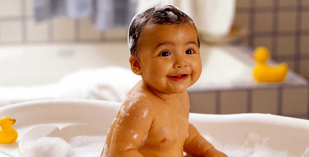 Infant taking a bath