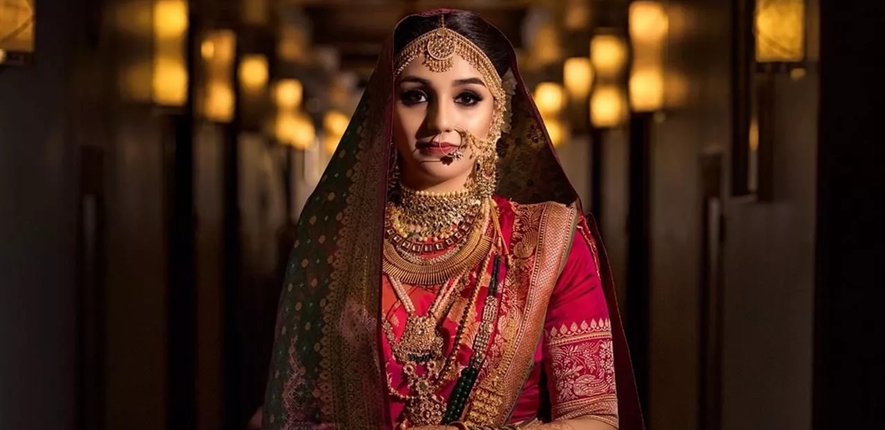 Kerala bride decked with gold jewellery