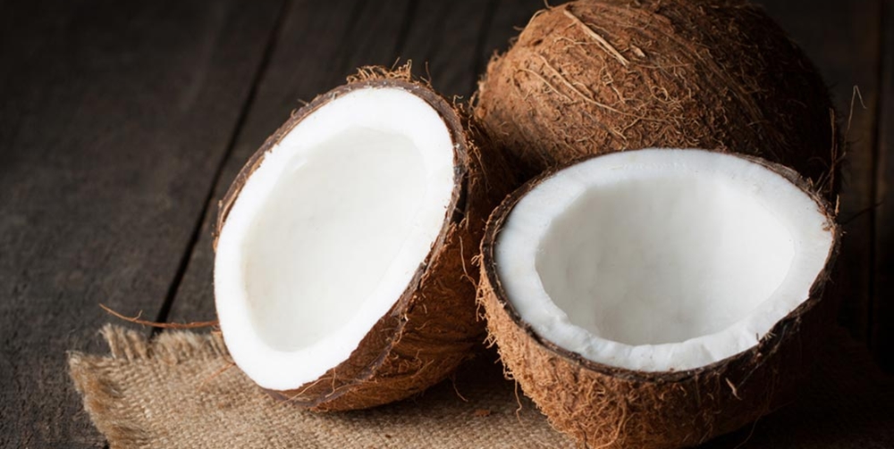 Coconut fruit broken in half