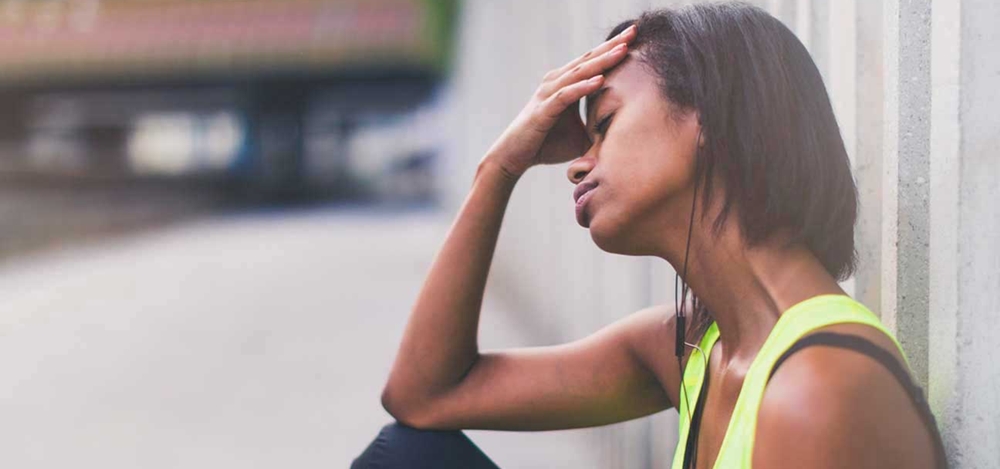 Woman experiencing headache