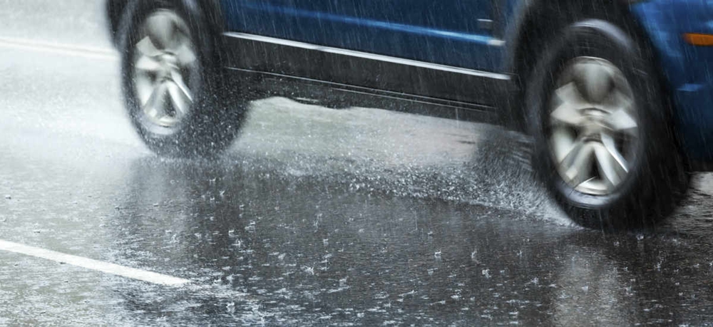 A car hydroplaning because of rain