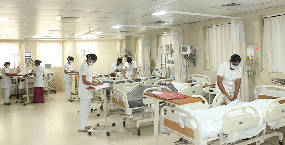 Patients being cared for in a clean hospital ward