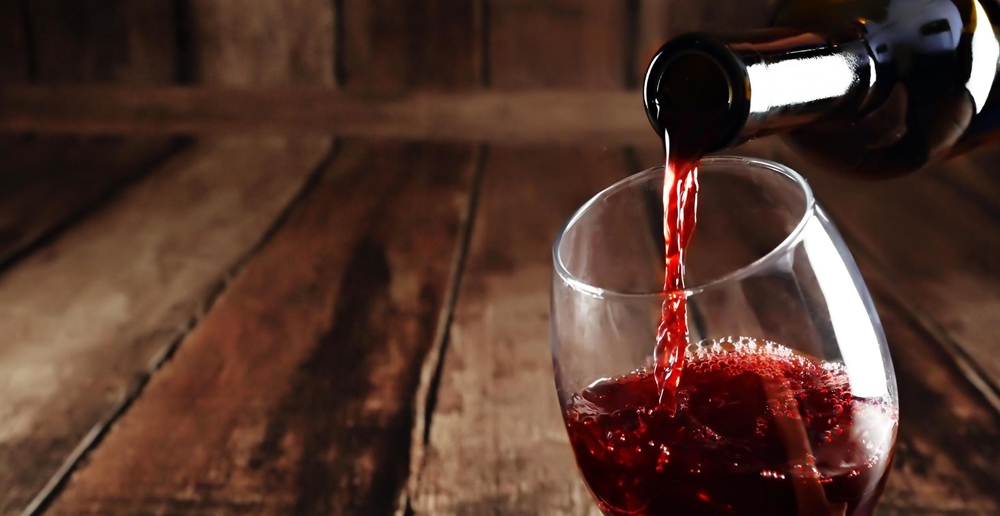 Pouring wine into glass