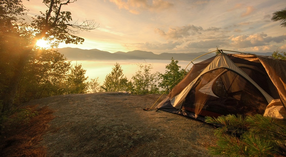 A tent set up on a camping site