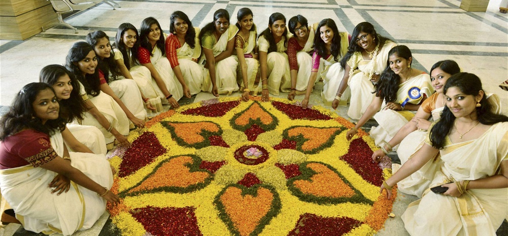Kerala women decorating the floor